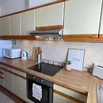 Title E Title - Oura Apartment